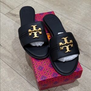 Tory Burch Black Sandals with Gold Logo Accent